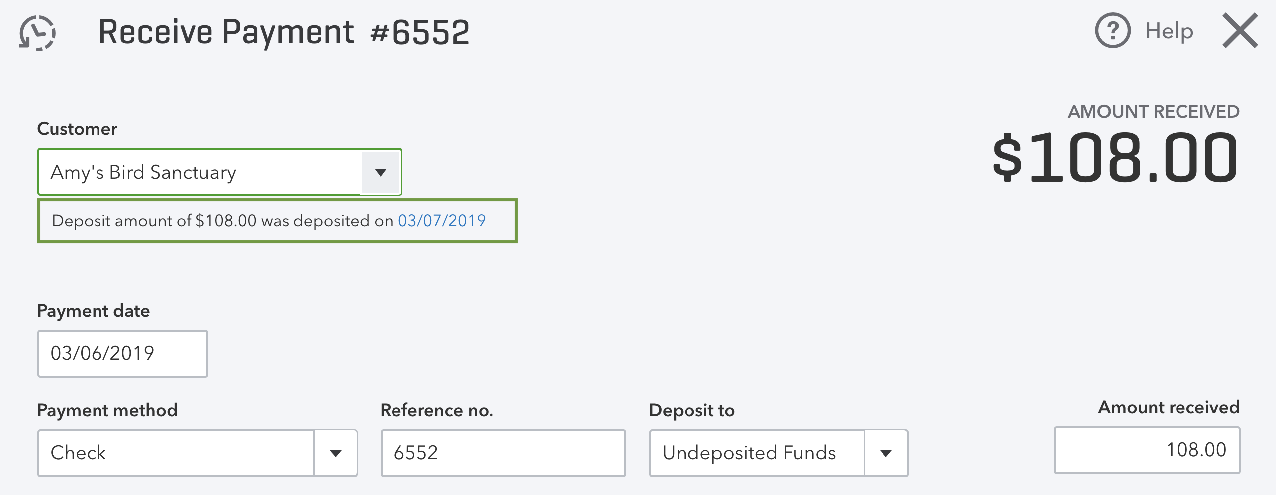 This image shows a received payment window, and if it’s connected to a bank deposit, you will see a link with a date underneath.